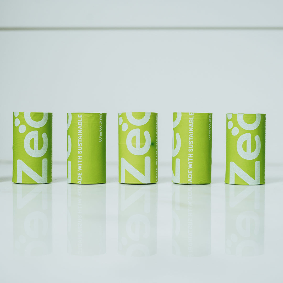 Image of bright green dog bag rolls and Zeofill logo printed. 
